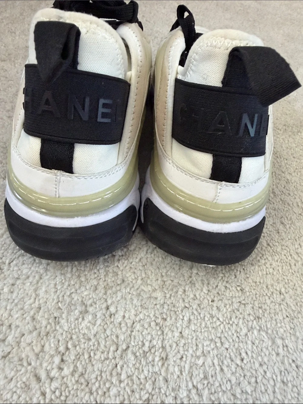 CHANEL Women’s Sneakers in White, Black and Cream